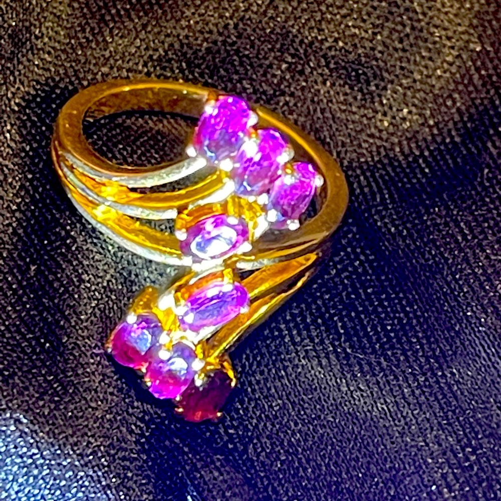 Woman’s ring colorful setting.
